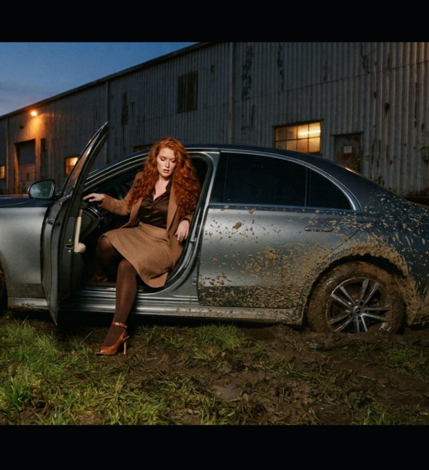Stuck Saleswoman Helpless in Mud