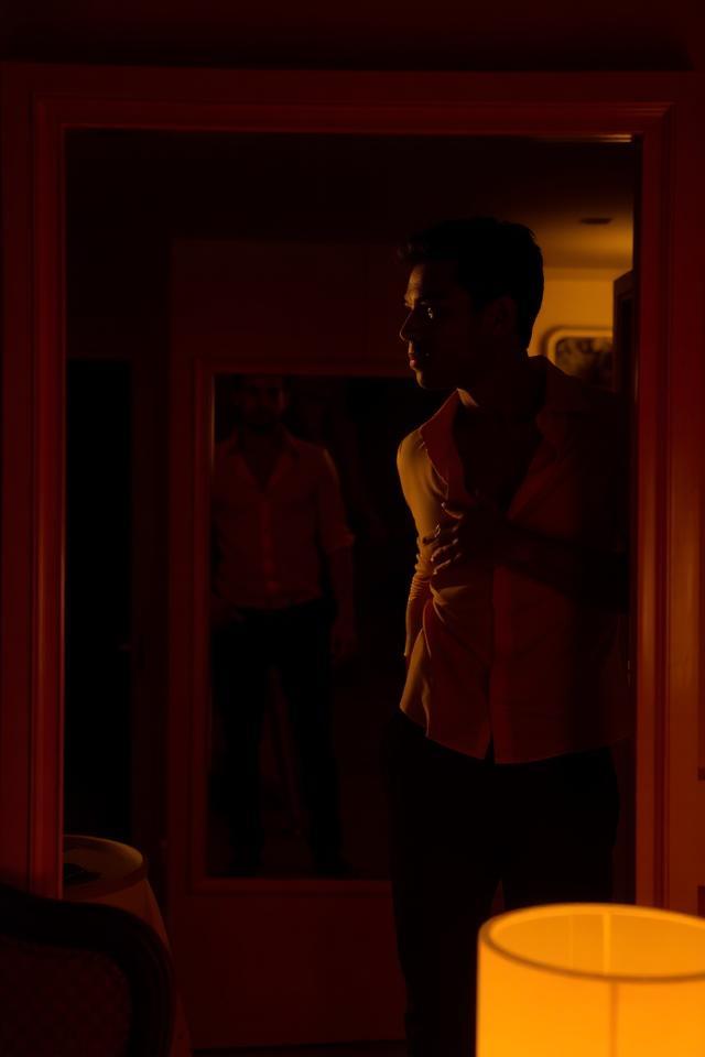 Mirrored Desire and the Watchful Stranger